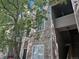 Stylish condo exterior with stone accents, a well-maintained facade, and an inviting entrance at 7369 S Alkire St # 203, Littleton, CO 80127