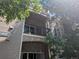 A beautiful condo building with a private balcony providing outdoor living space at 7369 S Alkire St # 203, Littleton, CO 80127