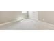 Bedroom featuring soft carpeting and a double door closet at 21022 E 63 Dr, Aurora, CO 80019