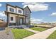 Eye-catching two-story home with a stylish facade, appealing landscaping and inviting entrance at 21022 E 63 Dr, Aurora, CO 80019