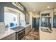 Well-equipped kitchen featuring stainless steel appliances, generous counter space, and streamlined design elements at 20553 E 50Th Pl, Denver, CO 80249