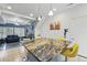 Eat-in kitchen with stainless appliances and large island with granite countertops and seating at 18619 E 50Th Pl, Denver, CO 80249