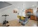 Kitchen island with three bar stools, stainless steel appliances and tile floors at 18619 E 50Th Pl, Denver, CO 80249