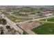 Aerial view showcases Apex Rec Center with baseball fields and greenery at 11165 W 58Th Ave, Arvada, CO 80002