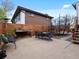 Backyard featuring a trampoline, outdoor furniture, and a stone pathway for relaxation and recreation at 11165 W 58Th Ave, Arvada, CO 80002