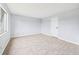 Bedroom with neutral carpet, a large window, and neutral paint at 190 E Highline Cir # 302, Centennial, CO 80122