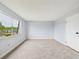 Bright bedroom with neutral carpet and a large window at 190 E Highline Cir # 302, Centennial, CO 80122