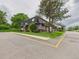 Exterior view of a multi-Gathering building featuring a balcony and well-maintained landscaping at 190 E Highline Cir # 302, Centennial, CO 80122