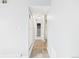 Hallway featuring tile flooring and neutral paint at 190 E Highline Cir # 302, Centennial, CO 80122