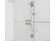 Storage lockers with locks and unit numbers on white doors at 190 E Highline Cir # 302, Centennial, CO 80122