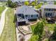 A beautiful home with a spacious yard, well-manicured lawn, and a lovely outdoor living area at 16485 E 117Th Ave, Commerce City, CO 80022