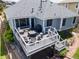 A stylish, elevated deck featuring comfortable seating and an outdoor grill, perfect for entertaining at 16485 E 117Th Ave, Commerce City, CO 80022