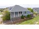 A well-maintained two-story home featuring a spacious porch at 16485 E 117Th Ave, Commerce City, CO 80022