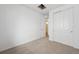 Neutral bedroom with closet and en-suite bathroom at 230 Lark Sparrow Way, Bennett, CO 80102