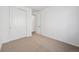 Neutral bedroom with closet and en-suite bathroom at 230 Lark Sparrow Way, Bennett, CO 80102