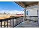 Covered patio showing the exterior view of the property at 230 Lark Sparrow Way, Bennett, CO 80102