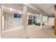 This basement features a fireplace in the background and interesting wall decor at 1027 Norfolk St, Aurora, CO 80011