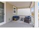 Cozy covered patio featuring outdoor furniture and privacy wall at 16108 Red Bud Loop, Parker, CO 80134