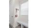 Cozy entryway with a bench and hooks for coats and bags, near the door at 16108 Red Bud Loop, Parker, CO 80134