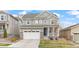 Charming two-story home with a well-manicured lawn and a two-car garage, perfect for suburban living at 16108 Red Bud Loop, Parker, CO 80134