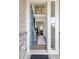 Elegant foyer with hardwood floors, a view of the upper landing, and an open layout at 16108 Red Bud Loop, Parker, CO 80134