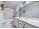 Well lit bathroom featuring a shower and tub combo and large vanity at 2882 Signal Creek Dr, Thornton, CO 80241