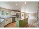 Bright kitchen featuring stainless steel appliances, granite counters, and modern cabinetry at 2882 Signal Creek Dr, Thornton, CO 80241