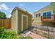 Backyard view of green storage shed at 2882 Signal Creek Dr, Thornton, CO 80241