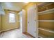 Walk-in closet offers custom shelves, drawers, and hanging rods for organized storage and efficient space usage at 2882 Signal Creek Dr, Thornton, CO 80241