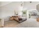 Spacious bedroom with large window and ceiling fan offers lots of natural light at 6429 S Jamaica Cir, Englewood, CO 80111