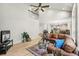 Bright living room with vaulted ceilings and an open layout, ideal for relaxation and gatherings at 6429 S Jamaica Cir, Englewood, CO 80111