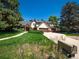 Charming two-story home with well-maintained landscaping and a spacious driveway at 15395 E Penwood Pl, Aurora, CO 80015
