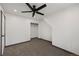 A bedroom with neutral walls, carpeted floors, ceiling fan and closet at 46 Silver Creek Rd, Idaho Springs, CO 80452