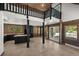 Open-concept kitchen with dark cabinets, an island, and views of the outdoors at 46 Silver Creek Rd, Idaho Springs, CO 80452