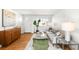 Cozy living area with modern furnishings, hardwood floors, and a welcoming atmosphere at 4210 S Dale Ct, Englewood, CO 80110