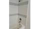 Tub and shower is tiled with a gray decorative border at 805 Park Ave, Fort Lupton, CO 80621