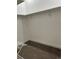 Walk-in closet with carpeted floor, light walls and shelving at 805 Park Ave, Fort Lupton, CO 80621