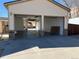 Spacious two-car garage, featuring an open back wall, and concrete floors at 805 Park Ave, Fort Lupton, CO 80621