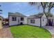 A well kept backyard with an exterior of the home and a shed, with an area of grass at 141 S Knox Ct, Denver, CO 80219