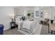 Comfortable bedroom showcasing stylish decor, neutral colors, and natural light at 141 S Knox Ct, Denver, CO 80219