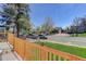 Inviting front porch with a view of the street and neighboring homes, perfect for relaxing outdoors at 141 S Knox Ct, Denver, CO 80219