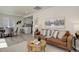 Bright living room with stylish decor, including a comfortable sofa, coffee table, and modern artwork at 141 S Knox Ct, Denver, CO 80219