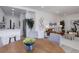 Open floor plan with a view from the dining area to the living room at 141 S Knox Ct, Denver, CO 80219