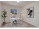 Bright office space with natural light, white desk, stylish decor, and a modern aesthetic at 141 S Knox Ct, Denver, CO 80219