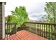 Wood deck overlooking a manicured lawn and neighborhood at 9272 Melborne Ct, Parker, CO 80134