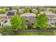 Backyard of a two-story home featuring a wooden deck, surrounded by mature trees and a well-maintained lawn at 9272 Melborne Ct, Parker, CO 80134
