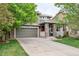 Charming two-story home with a two car garage and stone accents at 9272 Melborne Ct, Parker, CO 80134