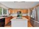 Well-equipped kitchen features stainless steel appliances and an island at 9272 Melborne Ct, Parker, CO 80134