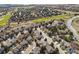 A neighborhood surrounds a golf course in this peaceful community at 598 Stonemont Dr, Castle Pines, CO 80108