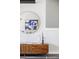 Close up of stylish decor and media cabinet in the living room at 9490 W 14Th Ave # 3, Lakewood, CO 80215
